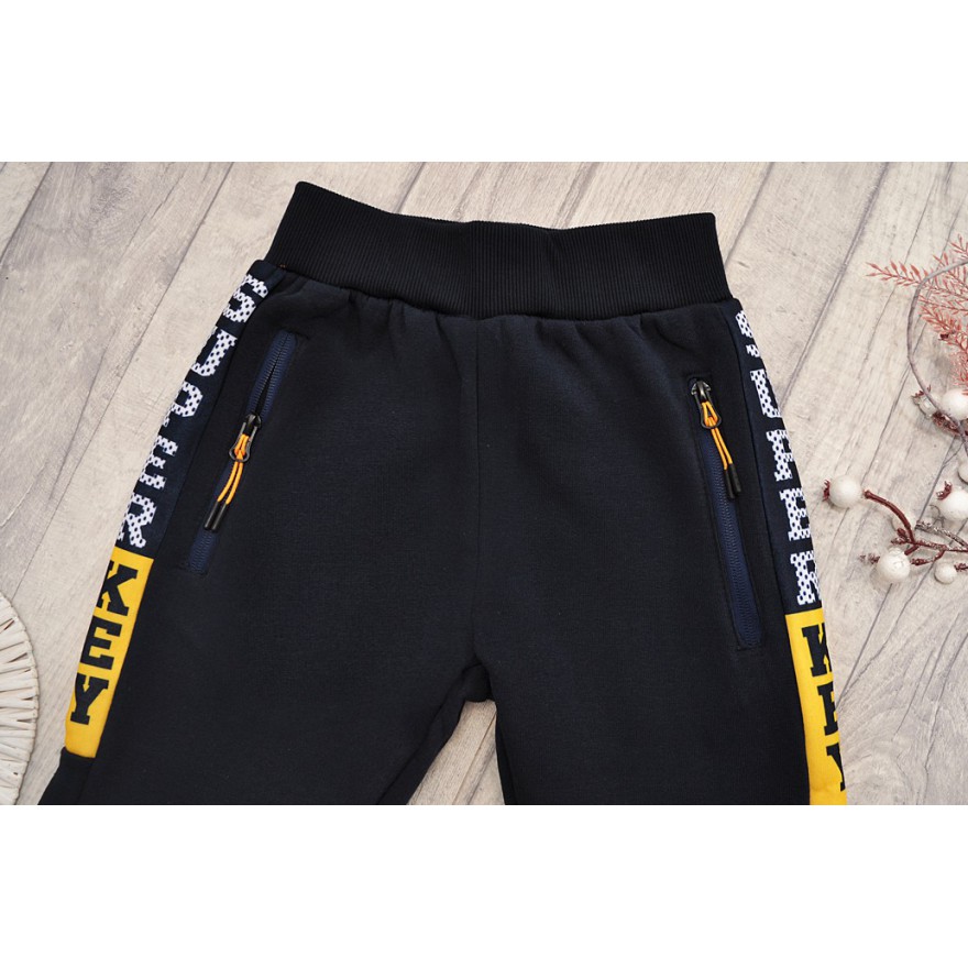 Granatowe SPODNIE ocieplane chłopięce spodenki dresowe SUPER KEY