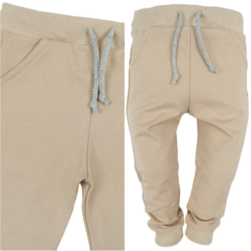 Beżowe spodnie dresowe wiązane wiosna jesień