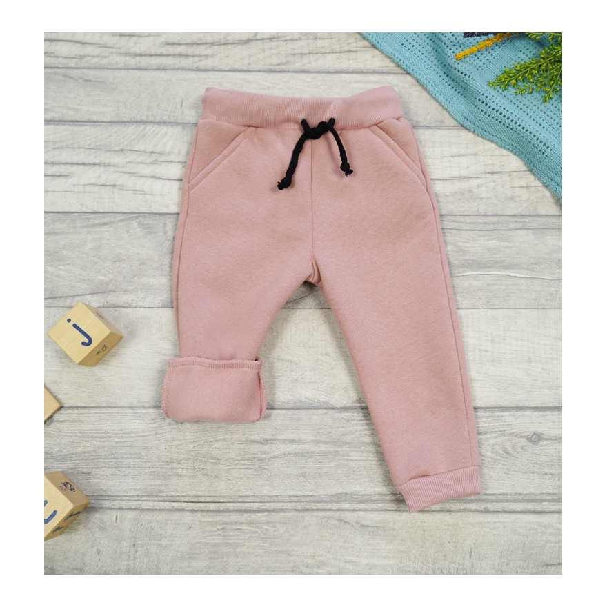 Pudrowy róż spodnie dresowe ocieplane wiązane jesień zima