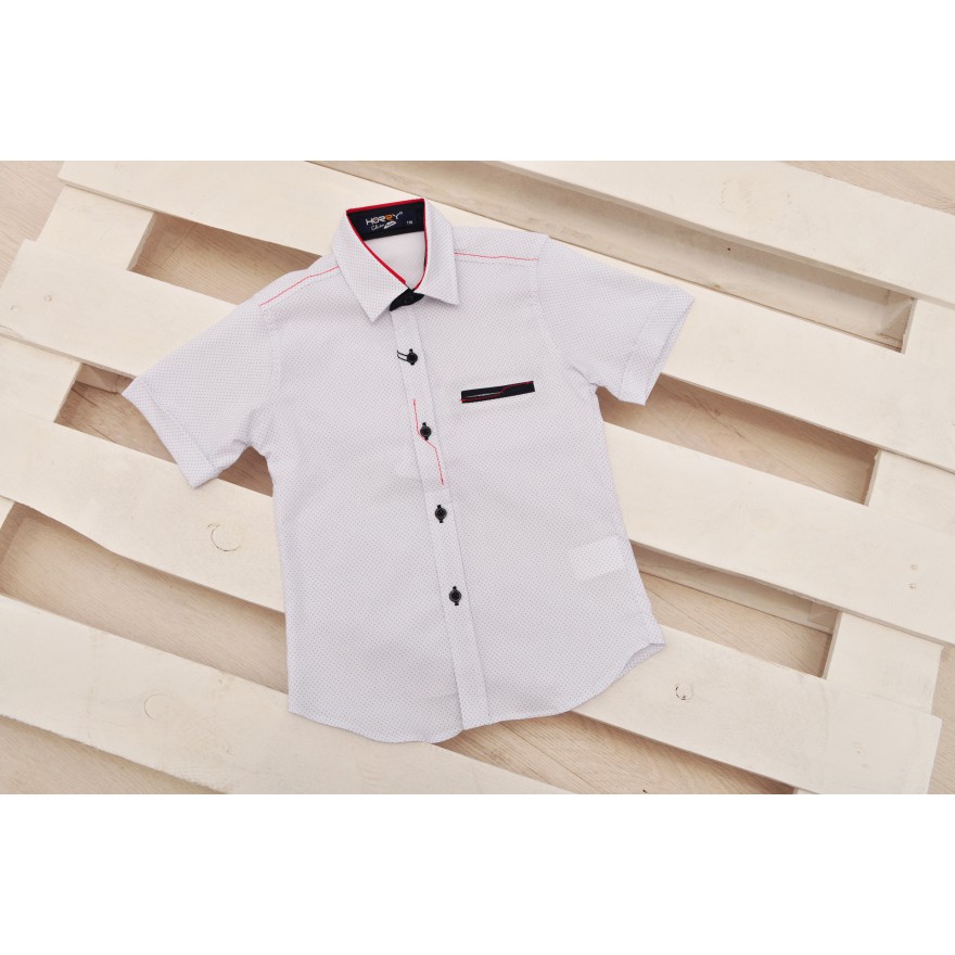 Biała koszula chłopięca z krótkim rękawem elegancka na lato